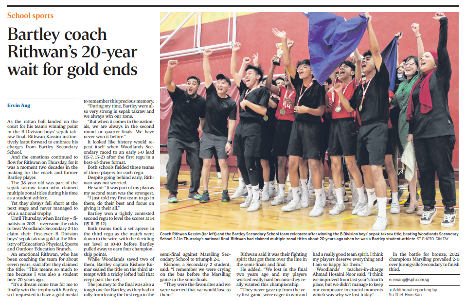 A newspaper article with a photo of a sports team celebrating with raised arms after winning a sepak takraw title.
